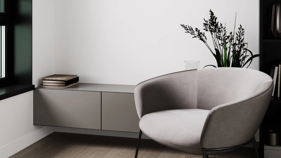 The Get Reconnected therapy room at 120 Eglinton Avenue East: two armchairs, a low table and a lamp.